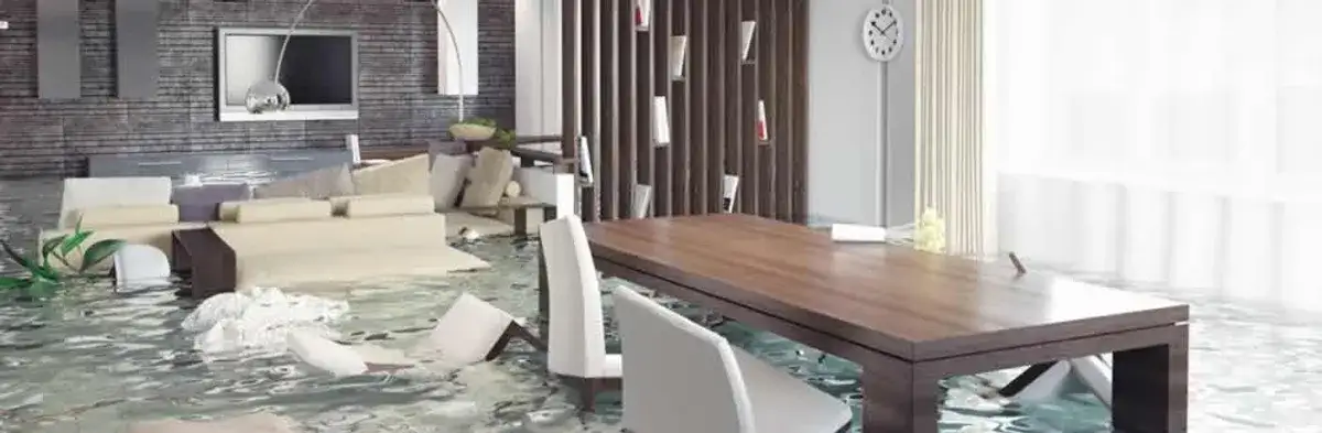 home interior affected by water damage with flooded floors and displaced furniture in Philadelphia, PA